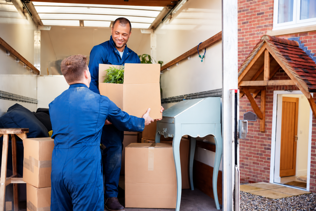 Removal Company Workers Unloading